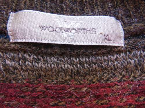 Handsome as new men`s acrylic knit sleeveless cardigan in brown and dark colours pattern lines.XL