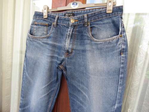 Men`s blue denim slim jeans in size 36W -32L.Pockets back and front.Polycotton and rayon.