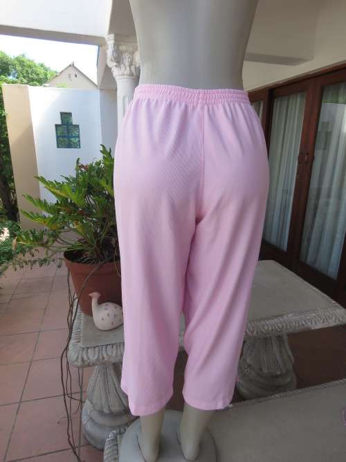 Comfy light rose pink corded polyester stretch cropped pants in size 42/18 by ENRICH from Thailand.