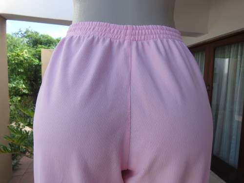 Comfy light rose pink corded polyester stretch cropped pants in size 42/18 by ENRICH from Thailand.