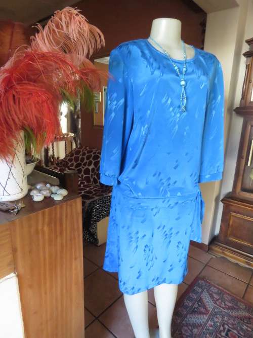 Chic,azure blue vintage dropped waist slip over dress in silky, shiny polyester.Size 40/16 by ALVECO