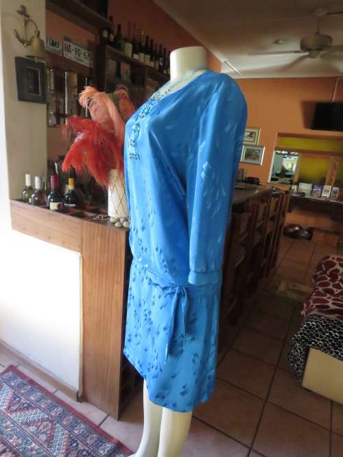 Chic,azure blue vintage dropped waist slip over dress in silky, shiny polyester.Size 40/16 by ALVECO