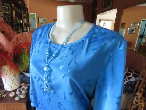 Chic,azure blue vintage dropped waist slip over dress in silky, shiny polyester.Size 40/16 by ALVECO