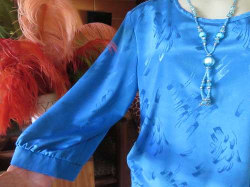 Chic,azure blue vintage dropped waist slip over dress in silky, shiny polyester.Size 40/16 by ALVECO