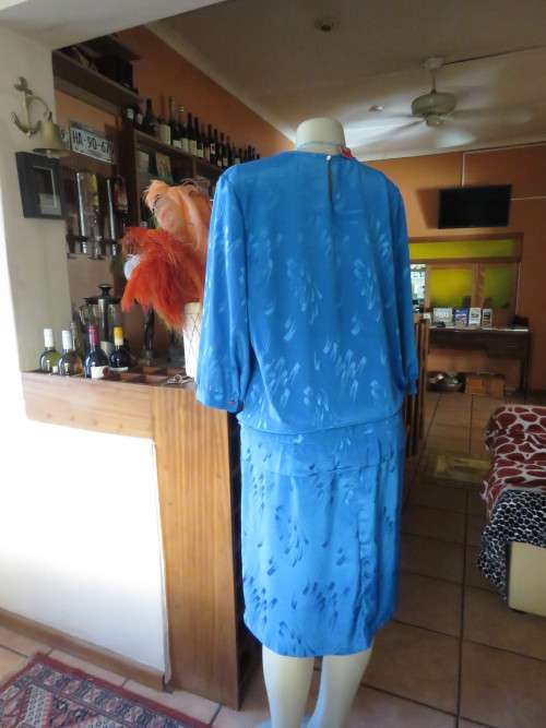 Chic,azure blue vintage dropped waist slip over dress in silky, shiny polyester.Size 40/16 by ALVECO