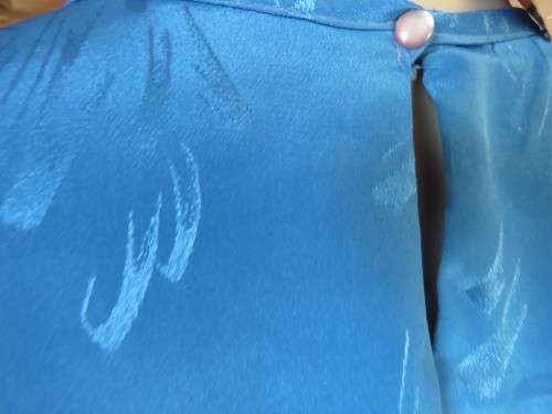 Chic,azure blue vintage dropped waist slip over dress in silky, shiny polyester.Size 40/16 by ALVECO