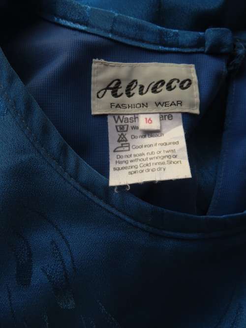Chic,azure blue vintage dropped waist slip over dress in silky, shiny polyester.Size 40/16 by ALVECO