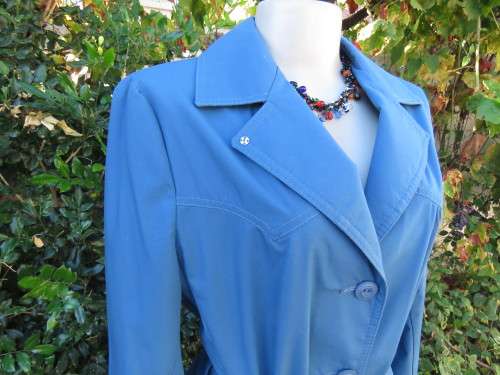 As new original RUDCO light weight steel blue chesterfield button down coat size 38/14.With belt.