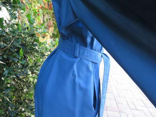 As new original RUDCO light weight steel blue chesterfield button down coat size 38/14.With belt.
