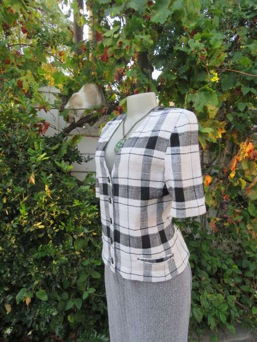 Cute large black/white check short sleeve cropped top.V neck and button down.Size 34 by FOSHINI