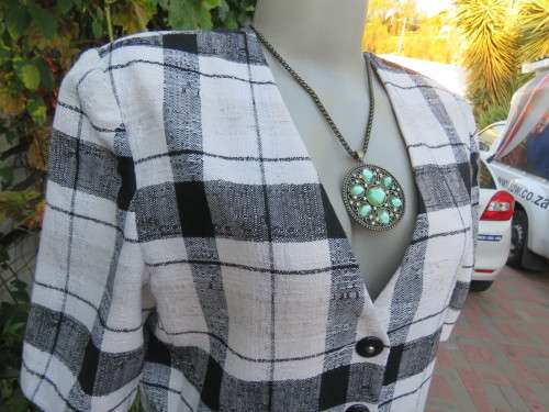 Cute large black/white check short sleeve cropped top.V neck and button down.Size 34 by FOSHINI