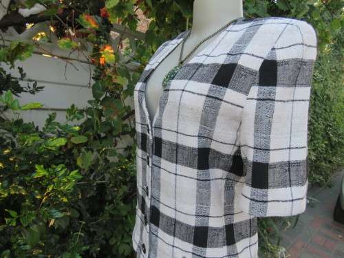 Cute large black/white check short sleeve cropped top.V neck and button down.Size 34 by FOSHINI