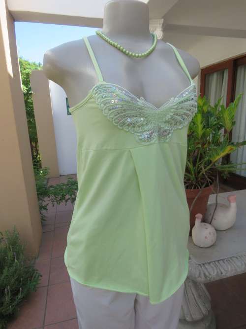 Sweet lime colour strappy top in stretch cotton with sequin butterfly on front.Size 32/8. New cond.