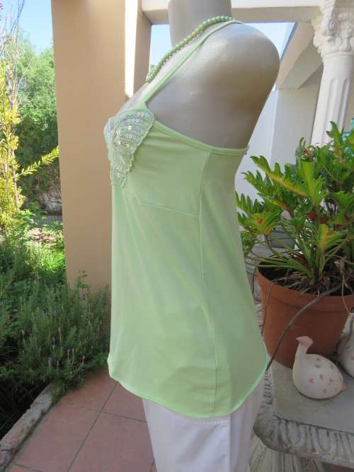 Sweet lime colour strappy top in stretch cotton with sequin butterfly on front.Size 32/8. New cond.