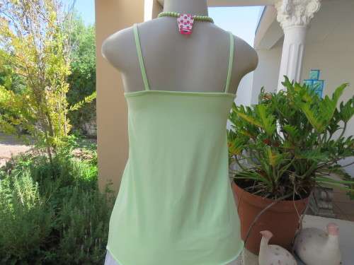 Sweet lime colour strappy top in stretch cotton with sequin butterfly on front.Size 32/8. New cond.