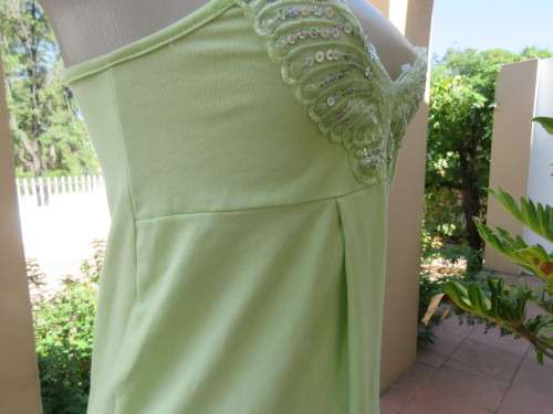 Sweet lime colour strappy top in stretch cotton with sequin butterfly on front.Size 32/8. New cond.