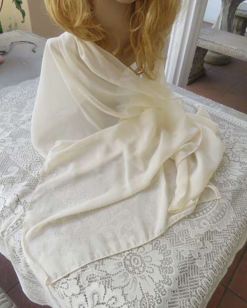 Soft sheer cream luxury scarf. Size 170cm x 47cm. As new condition.