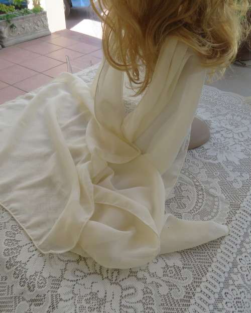 Soft sheer cream luxury scarf. Size 170cm x 47cm. As new condition.