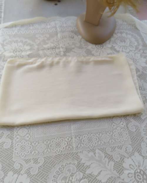 Soft sheer cream luxury scarf. Size 170cm x 47cm. As new condition.