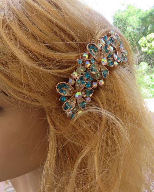 Glamorous metal gold toned hairclip with colourful stones. Suitable for long hair. New.