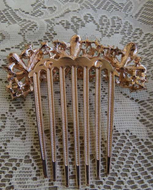 Glamorous metal gold toned hairclip with colourful stones. Suitable for long hair. New.