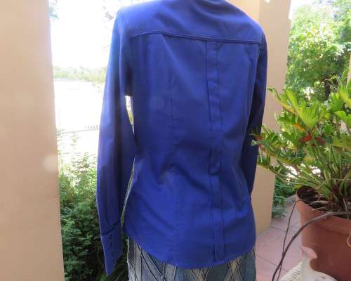 High quality long sleeve royal blue top by STUDIO W size 38/14.Hidden button down and shirt collar.