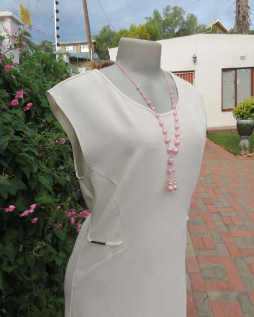 Very smart new slip over dress in light cream size 36/12 by MASSUMI.Sleeveless.Underarm inlays.