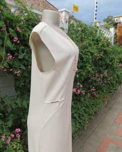 Very smart new slip over dress in light cream size 36/12 by MASSUMI.Sleeveless.Underarm inlays.