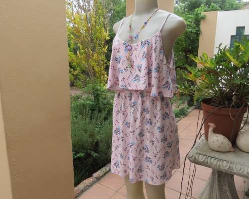 Cute little strappy dress in pale pink/white with red/blue tiny flowers.Size 38.With top overlay