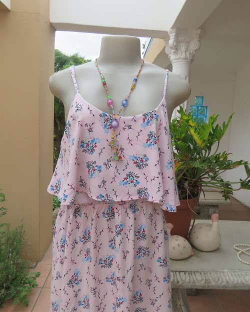 Cute little strappy dress in pale pink/white with red/blue tiny flowers.Size 38.With top overlay