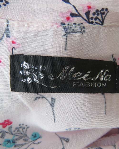 Cute little strappy dress in pale pink/white with red/blue tiny flowers.Size 38.With top overlay