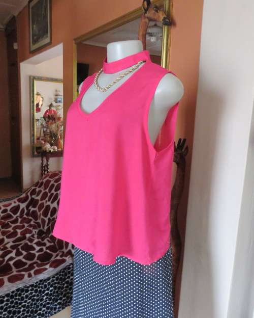 Sweet crimson pink slip over top with V front and banded collar.Size 38/14.Slit at back with buttons