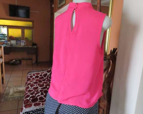 Sweet crimson pink slip over top with V front and banded collar.Size 38/14.Slit at back with buttons