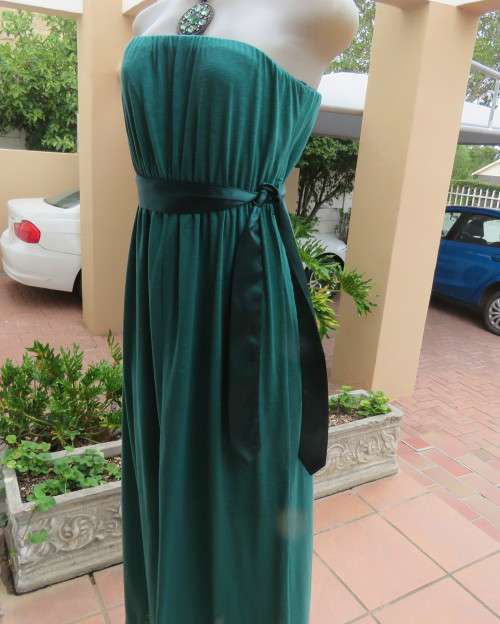 Fabulous strapless jade colour maxi dress fully lined size 34/10.Elasticated waist.Satin belt.As new