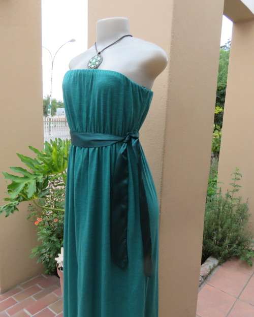Fabulous strapless jade colour maxi dress fully lined size 34/10.Elasticated waist.Satin belt.As new