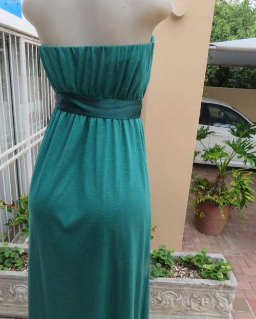 Fabulous strapless jade colour maxi dress fully lined size 34/10.Elasticated waist.Satin belt.As new