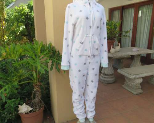 Warm and cost ladies hooded onesie pajamas in white with star pattern.Size 34 to 36.New condition.