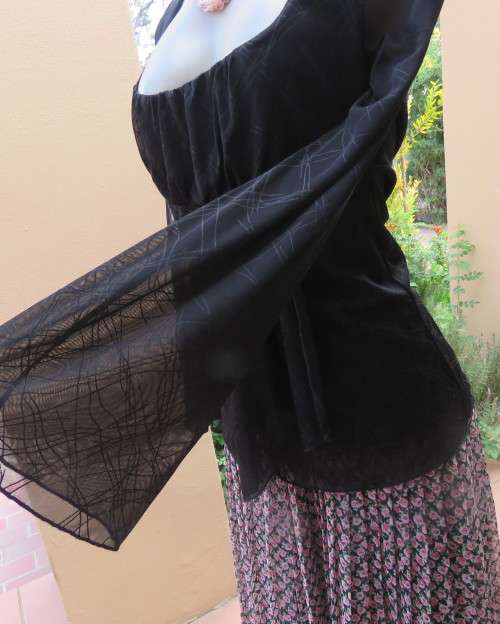 Sexy,smart soft draped black polyester empire long sleeve top size 36/12 by OASIS. As new.