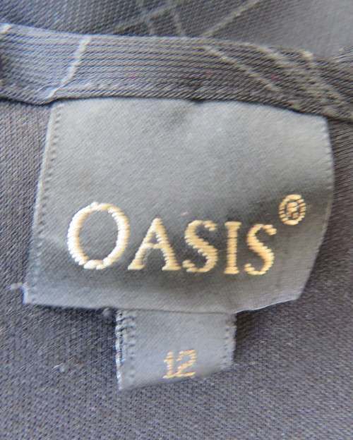 Sexy,smart soft draped black polyester empire long sleeve top size 36/12 by OASIS. As new.