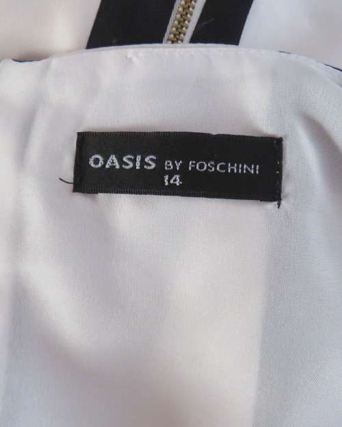 Flattering black/white wide vertical striped shift dress by OASIS size 38/14. Zip at back.As new.