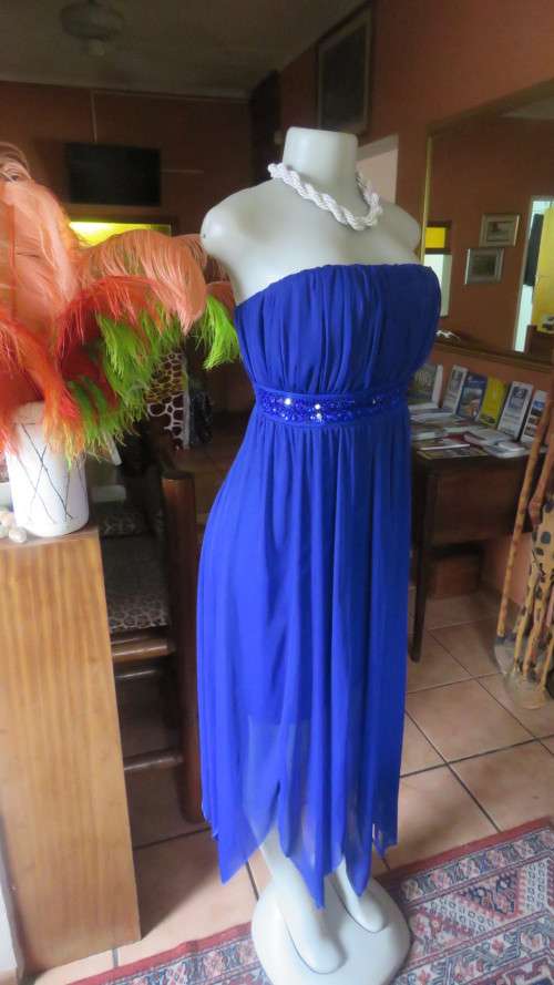 Hot strapless royal blue evening dress.Sheer overskirt.Ruched in top.Embellished.Size 32.Truworths.