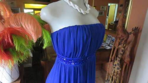 Hot strapless royal blue evening dress.Sheer overskirt.Ruched in top.Embellished.Size 32.Truworths.