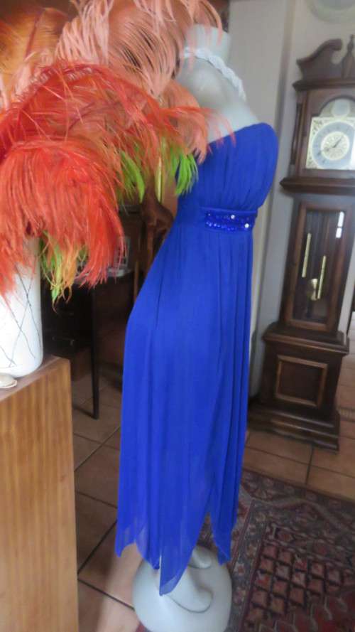Hot strapless royal blue evening dress.Sheer overskirt.Ruched in top.Embellished.Size 32.Truworths.