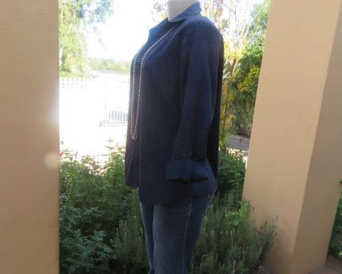 As new navy polycotton stretch long sleeve shirt.Skyblue polkadots.Open collar.Size 38 by MILADY`S