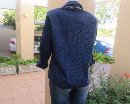 As new navy polycotton stretch long sleeve shirt.Skyblue polkadots.Open collar.Size 38 by MILADY`S