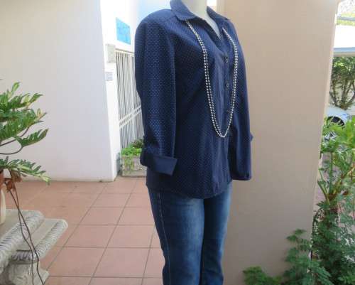 As new navy polycotton stretch long sleeve shirt.Skyblue polkadots.Open collar.Size 38 by MILADY`S