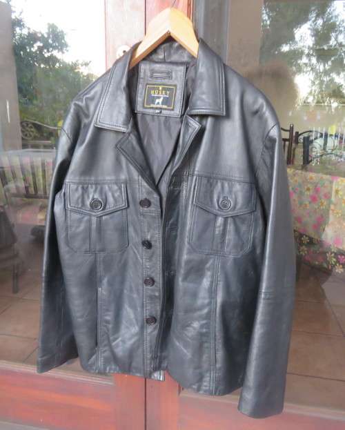 Genuine leather black Men`s jacket authentic original design.By HUSKY size 2XL.Pockets galore.As new