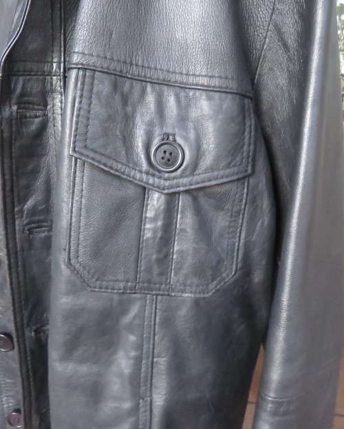 Genuine leather black Men`s jacket authentic original design.By HUSKY size 2XL.Pockets galore.As new
