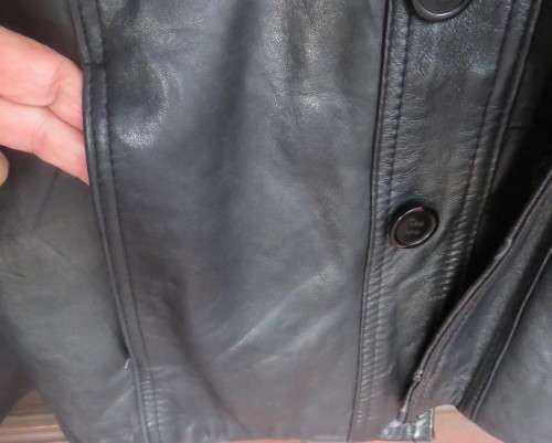 Genuine leather black Men`s jacket authentic original design.By HUSKY size 2XL.Pockets galore.As new