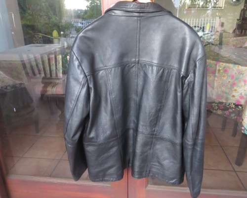 Genuine leather black Men`s jacket authentic original design.By HUSKY size 2XL.Pockets galore.As new